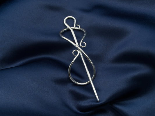 Sterling silver hair pin in the shape of the infinity symbol with a sterling silver needle