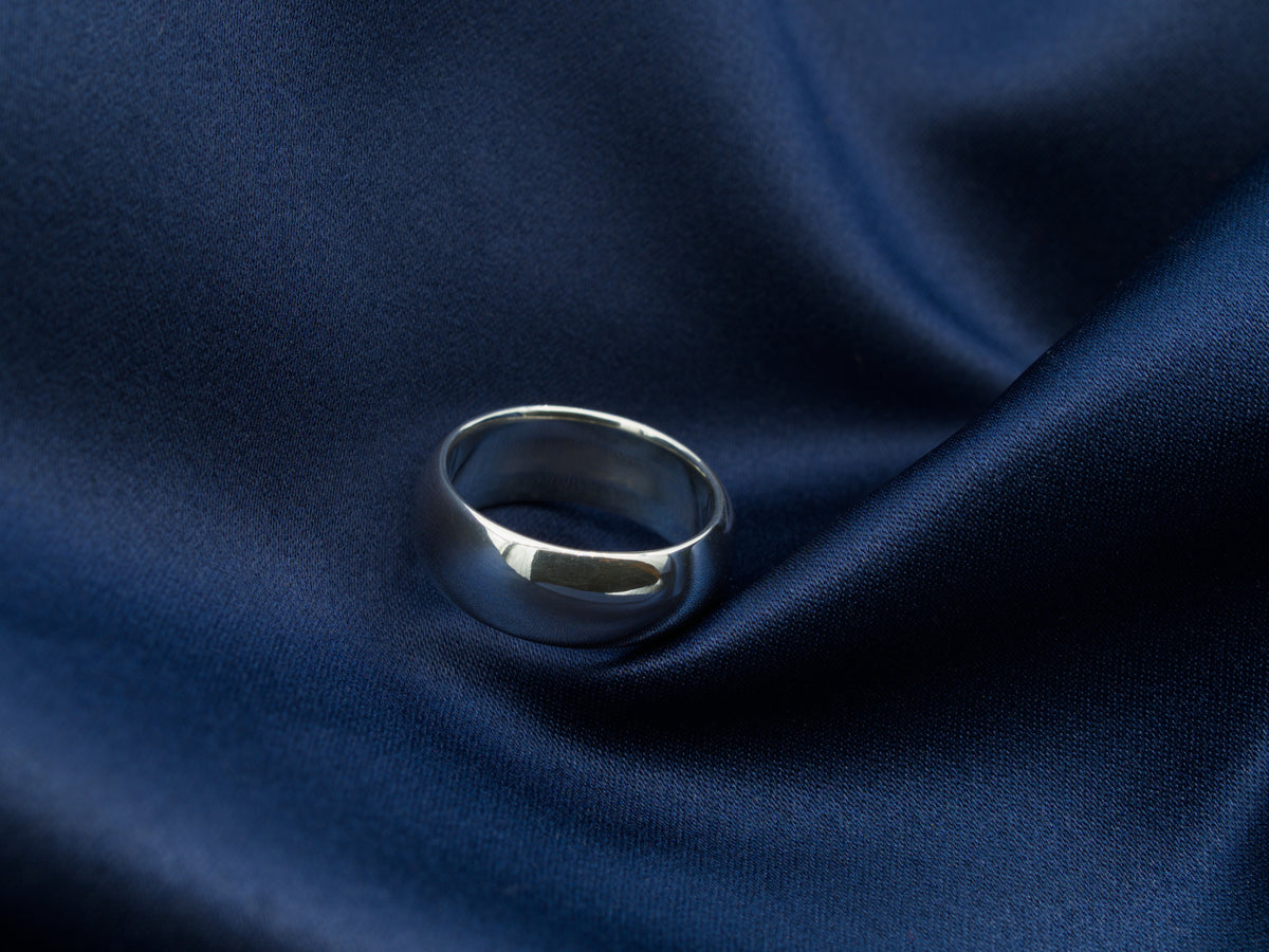 Polished sterling silver ring with a mirror finish