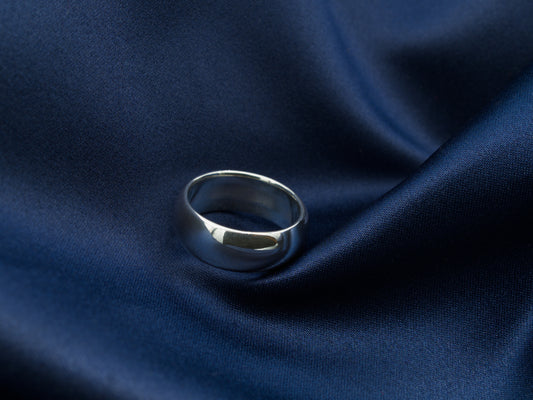 Polished sterling silver ring with a mirror finish